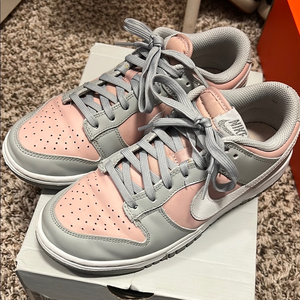 Nike Pink and Gray Sneakers with Low-Top Design and Perforated Texture